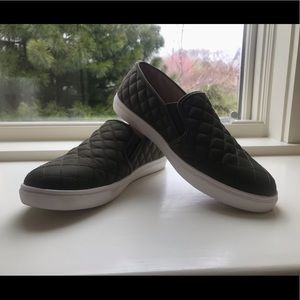 Green with white trim, slip-on shoes.